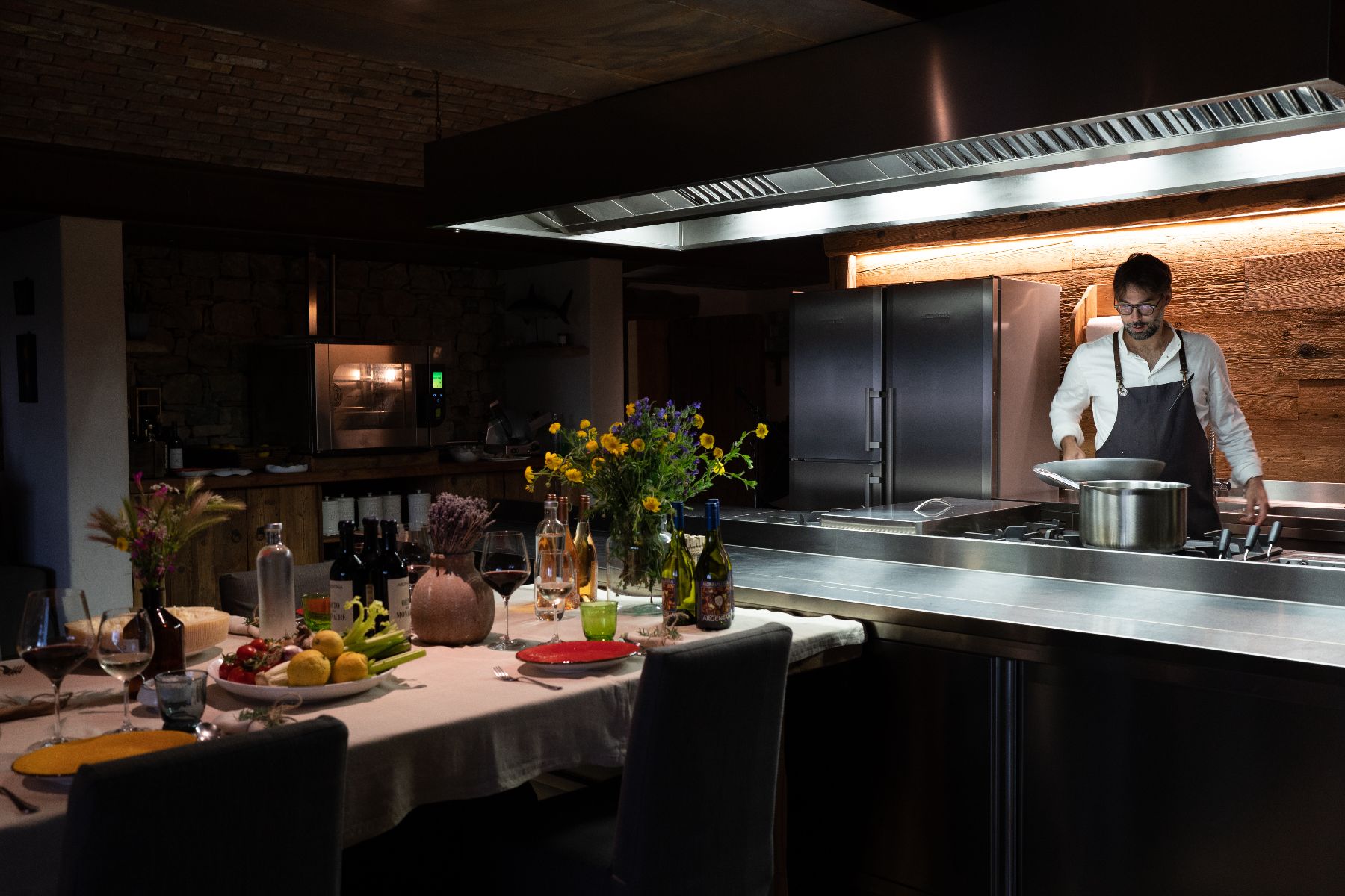 Kitchen and chef at Borgo Rinato in Tuscany