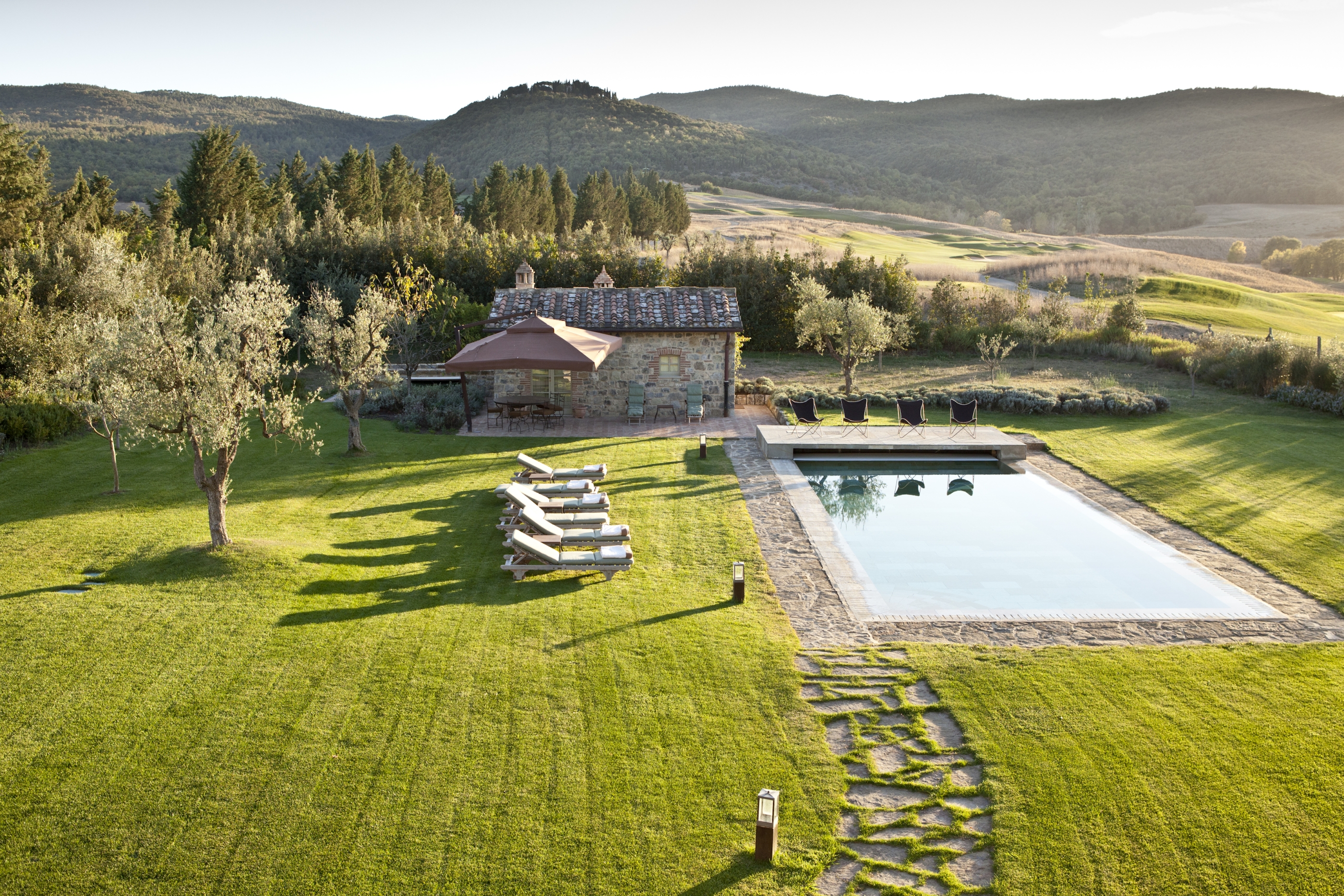 Swimming pool and pool house of Casa Biondi, Tuscany