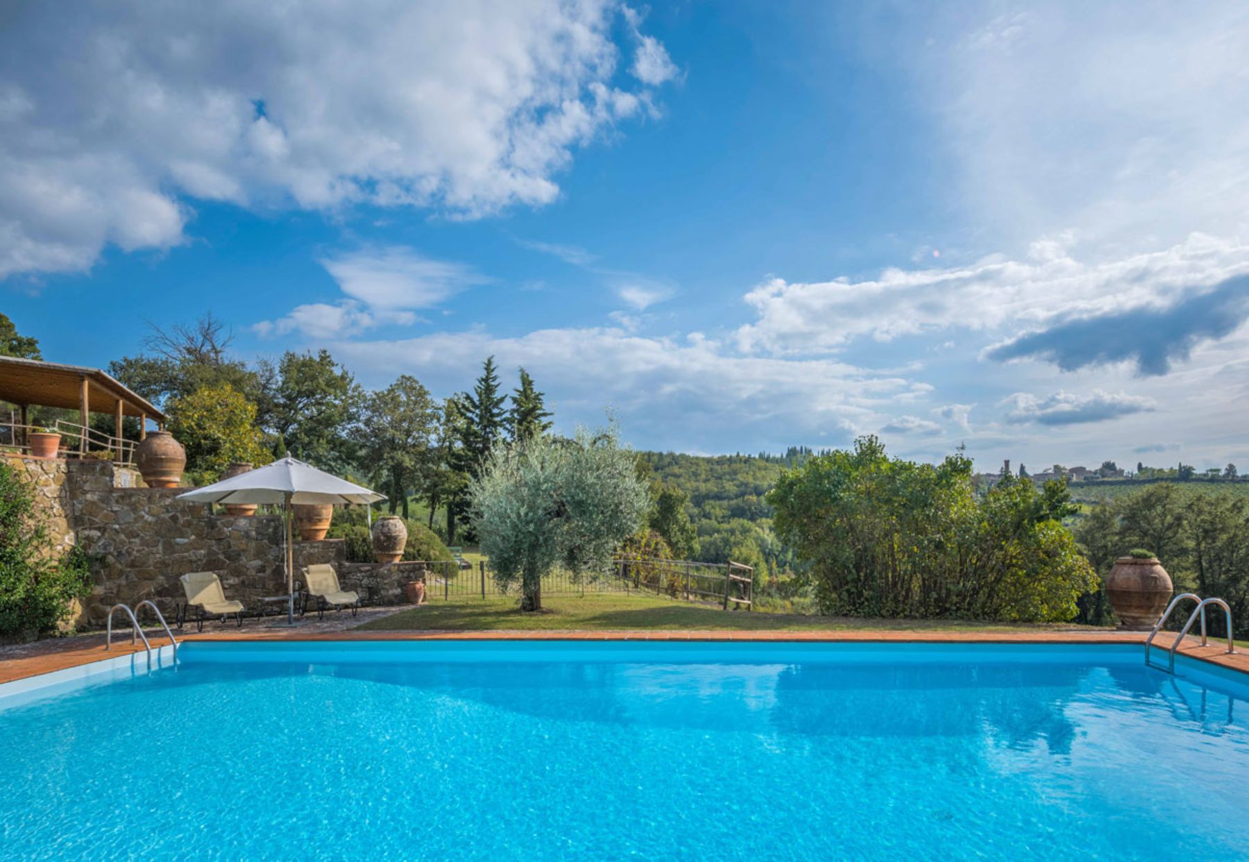 Pool with landscape view at Casa Picchio in Tuscany