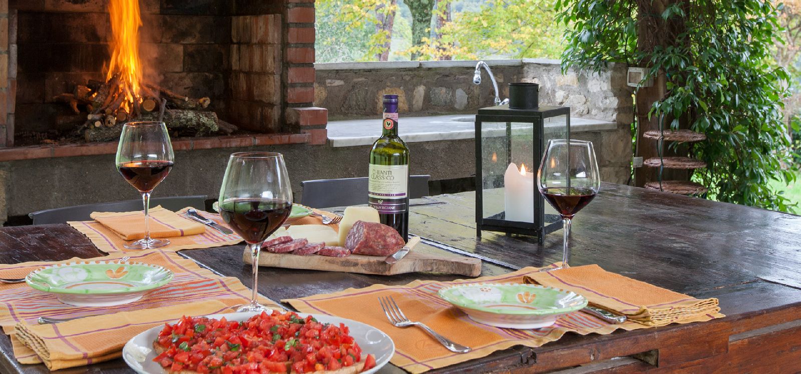 Tuscan dining in the loggia at villa Casale di Fiesole near Florence