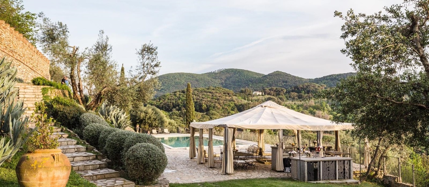 the pool tent and garden of Castello di Segalari, Tuscany