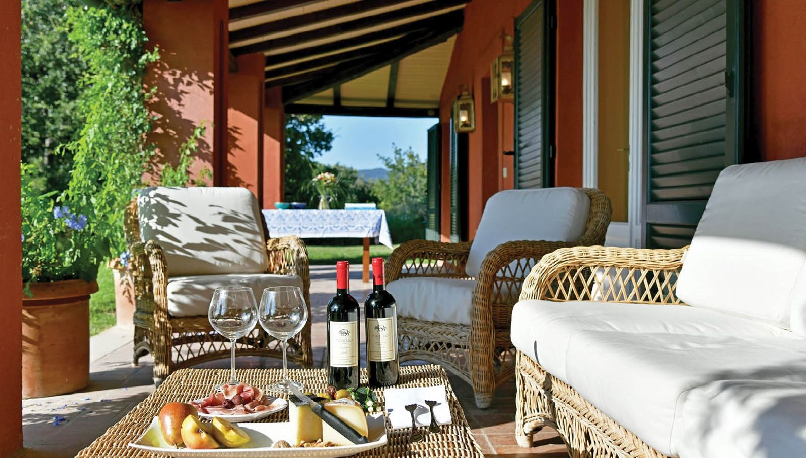 Wine on the terrace at villa La Civetta in Tuscany