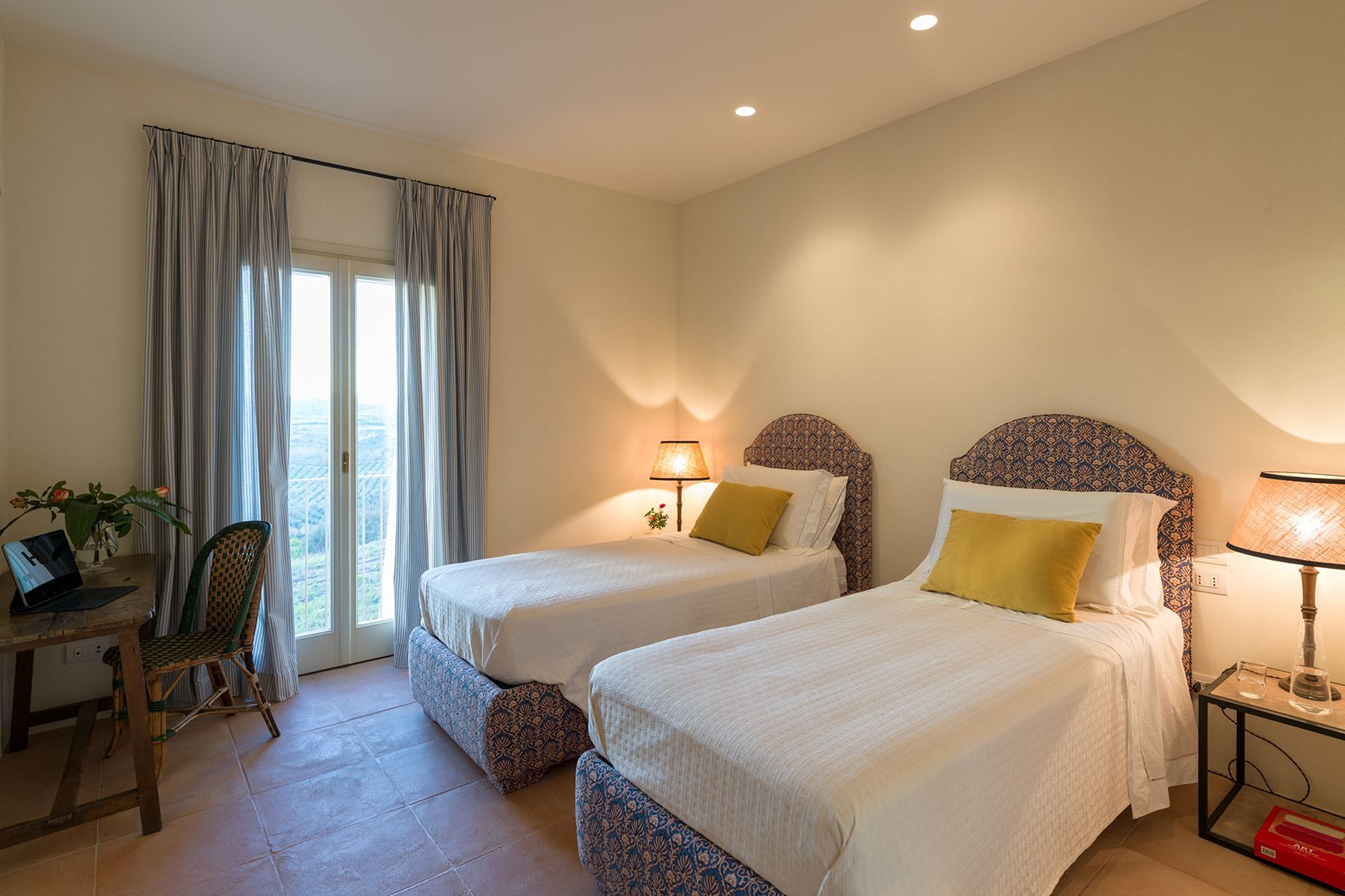 Twin bedroom at La Collina Farmhouse