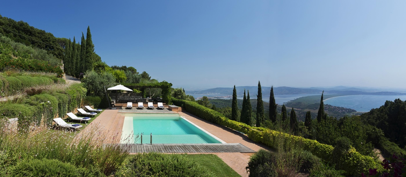 Swimming pool and view from La Feniglia, Tuscany