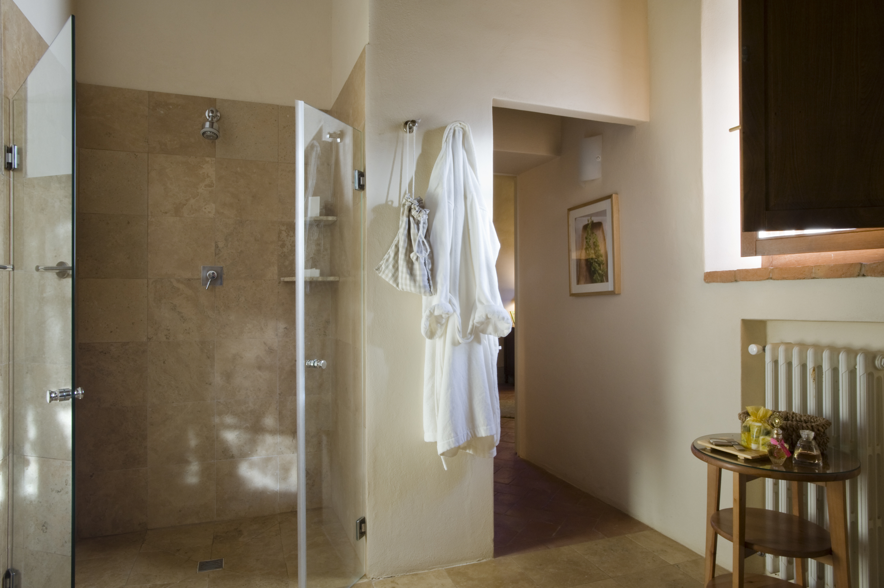 A bathroom with a walk-in shower at La Gavelli.