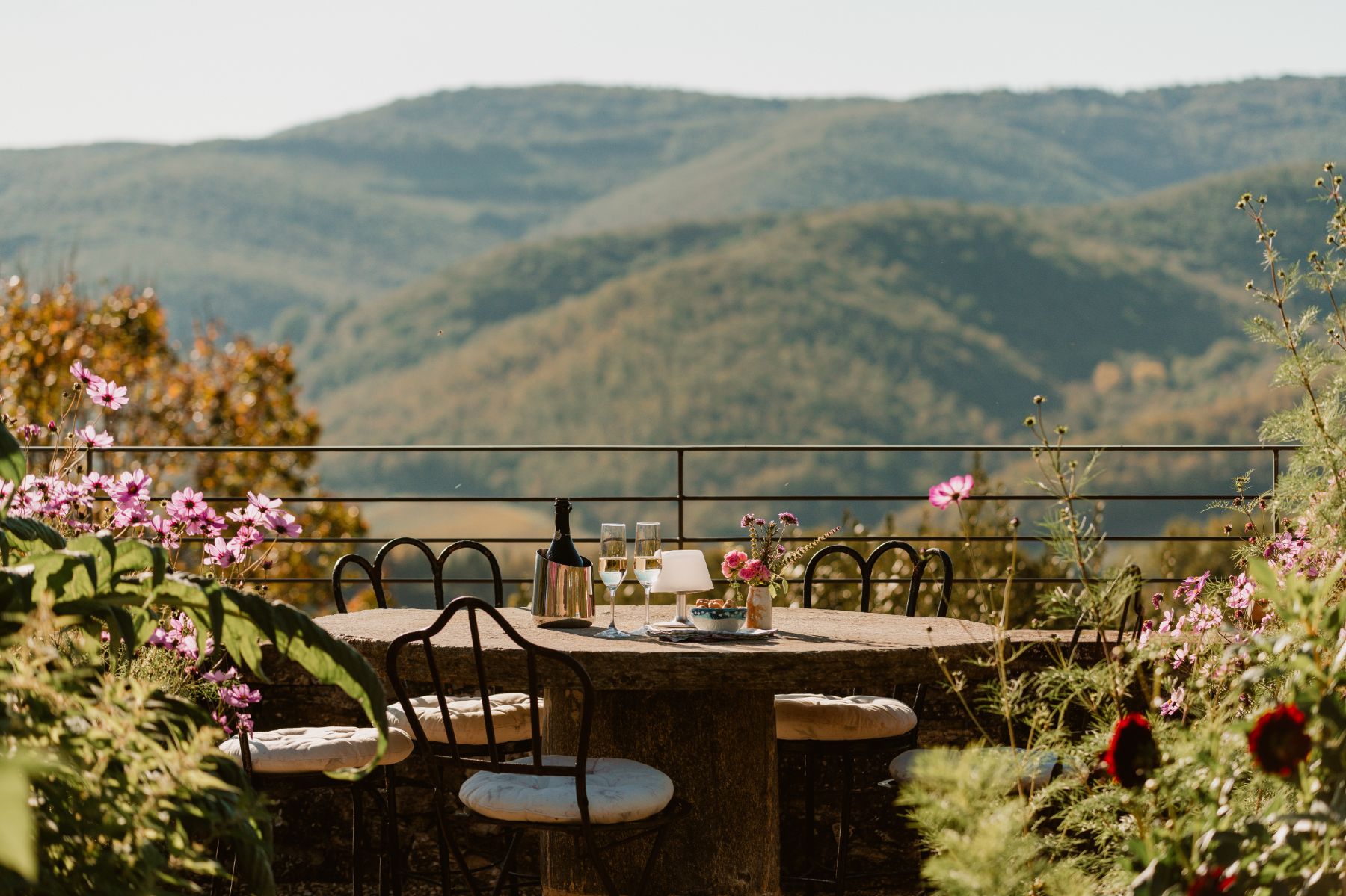 Outdoor coffee table overlooking the Tuscan hills at La Regina