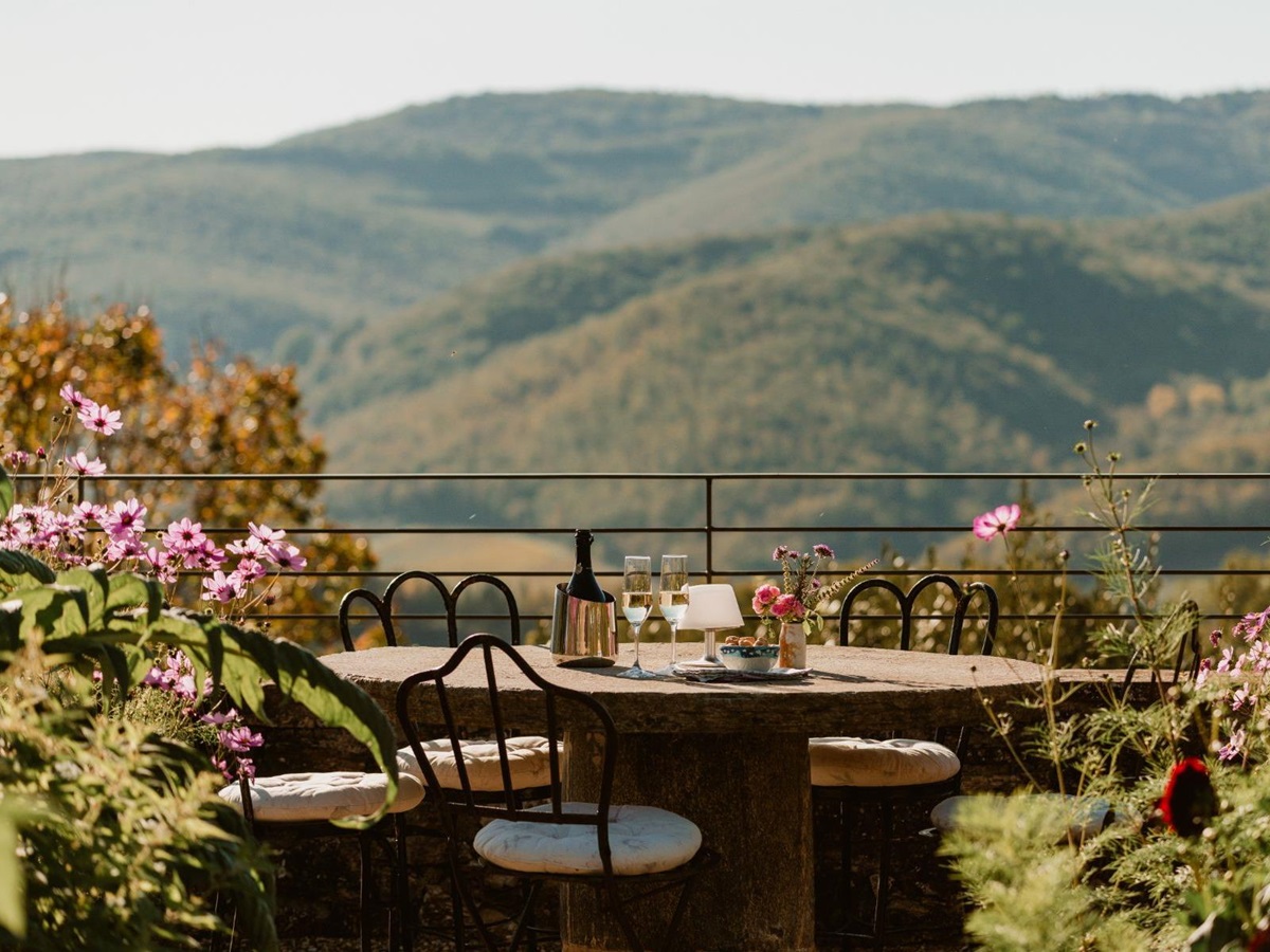 Outdoor coffee table overlooking the Tuscan hills at La Regina