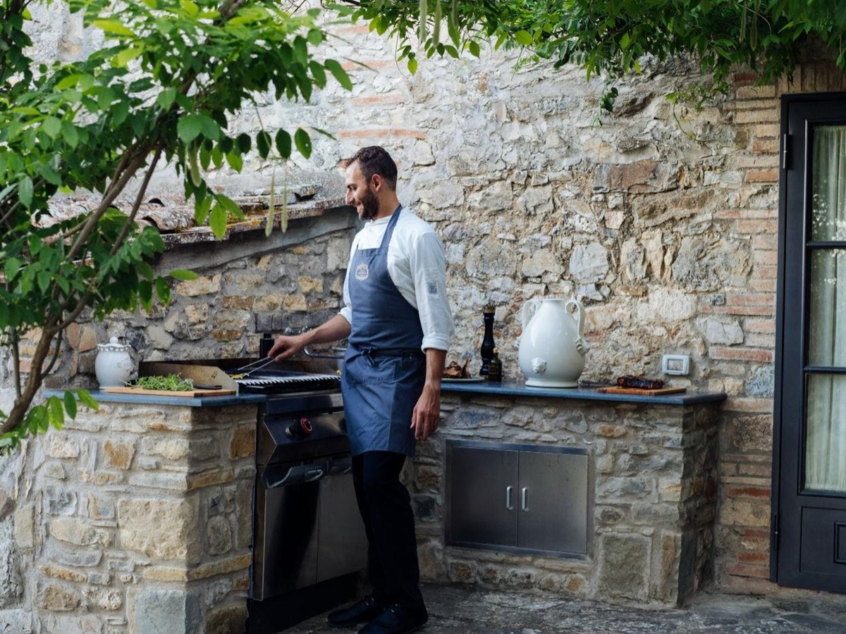 A chef prepares delicious food at La Tenuta.