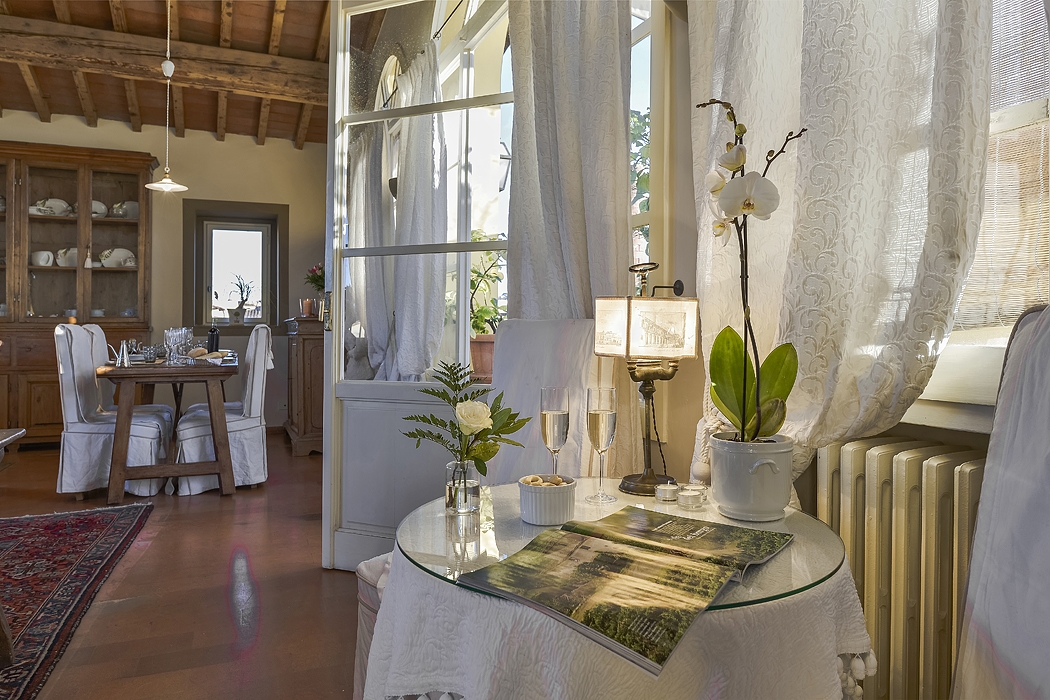 Seating area next to the dining room of La Viscontina, Tuscany