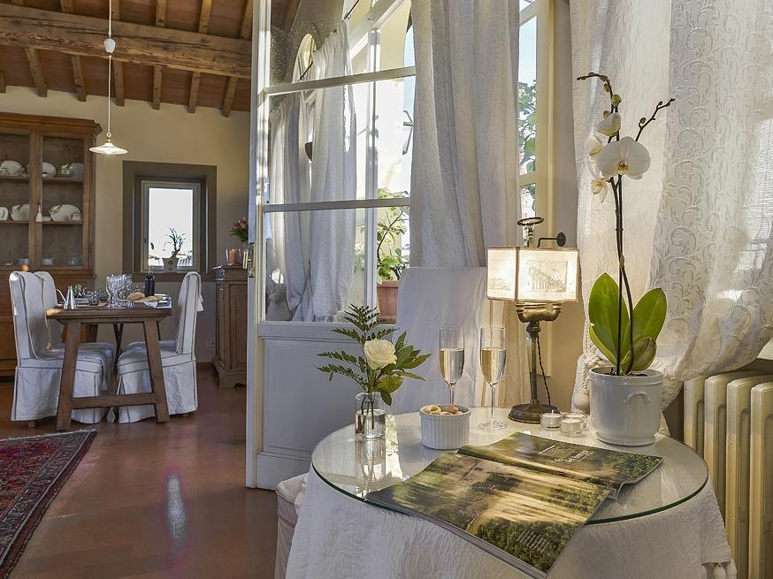 Seating area next to the dining room of La Viscontina, Tuscany