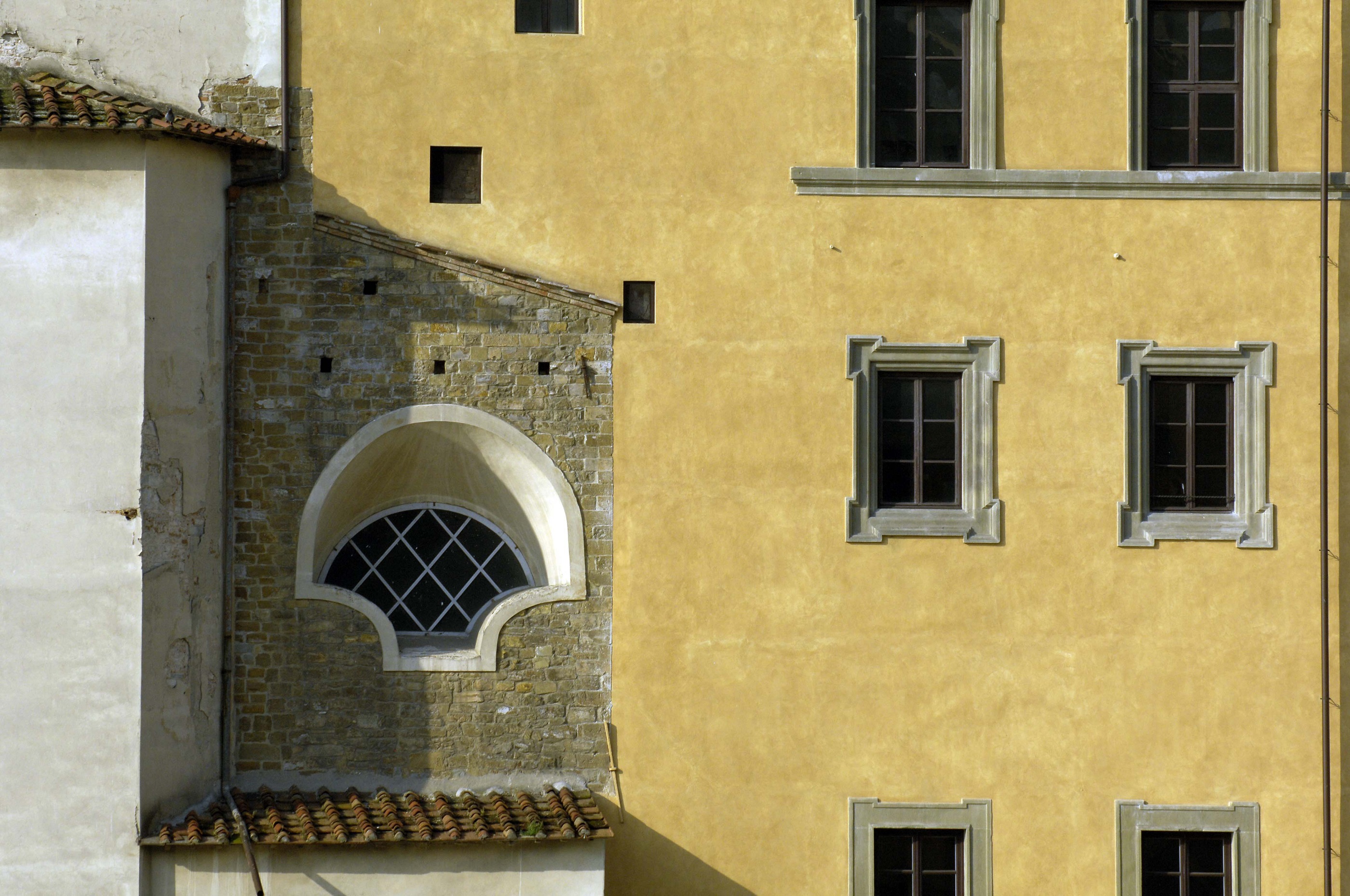 yellow wall of Palazzo Fiorentina, Tuscany