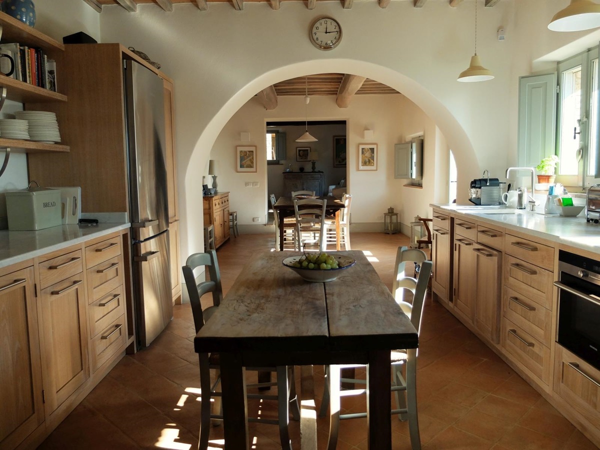 Kitchen with long table at Podere Caterina in Tuscany