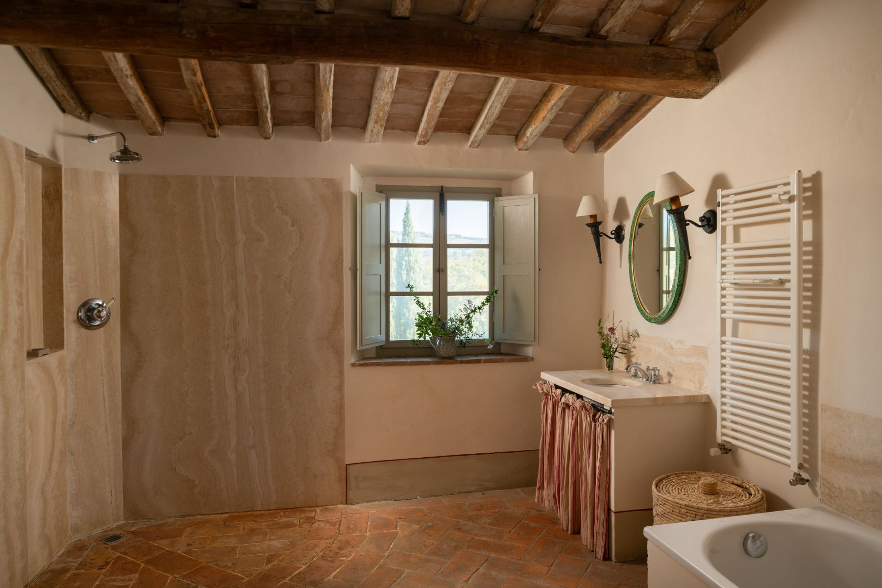 Bathroom with large shower and large window at Podere Cipressi in Tuscany