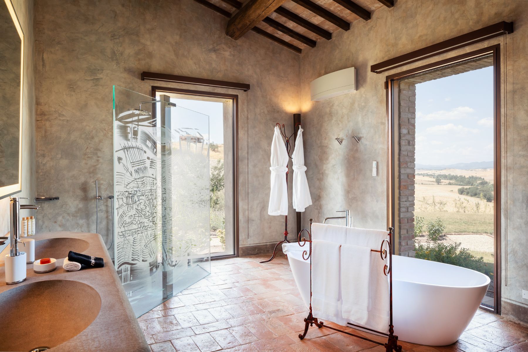 Bathroom with hill view at Podere Martino in Tuscany
