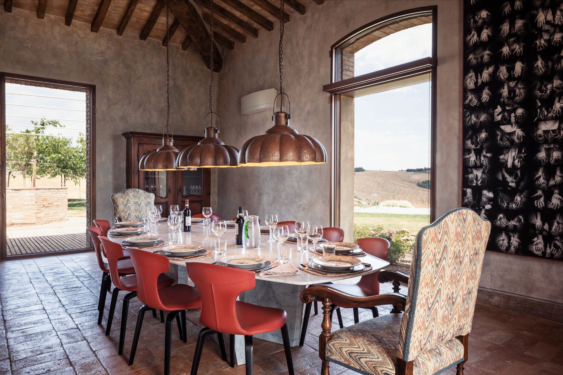 Dining table with window view at Podere Martino in Tuscany