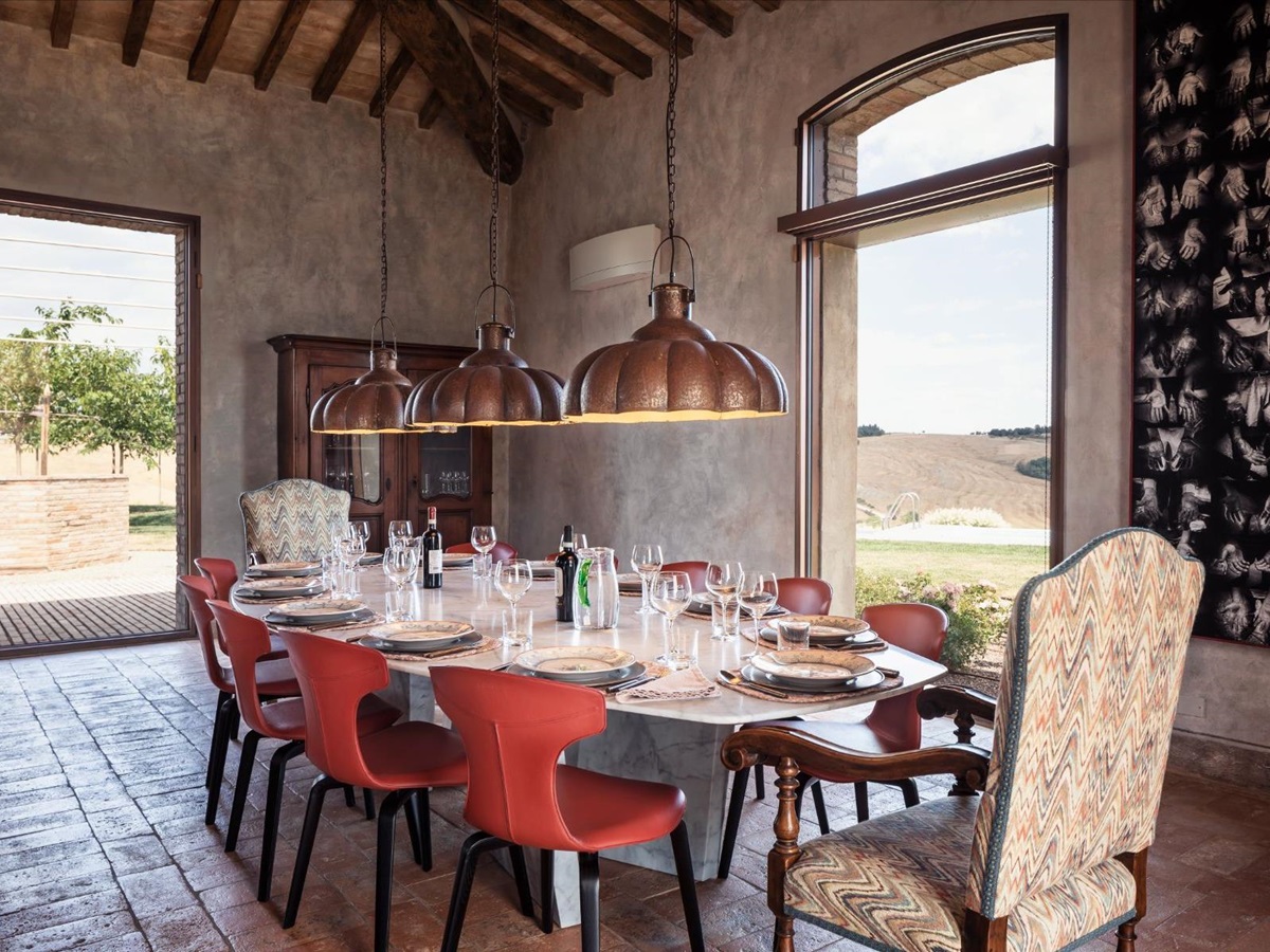 Dining table with window view at Podere Martino in Tuscany