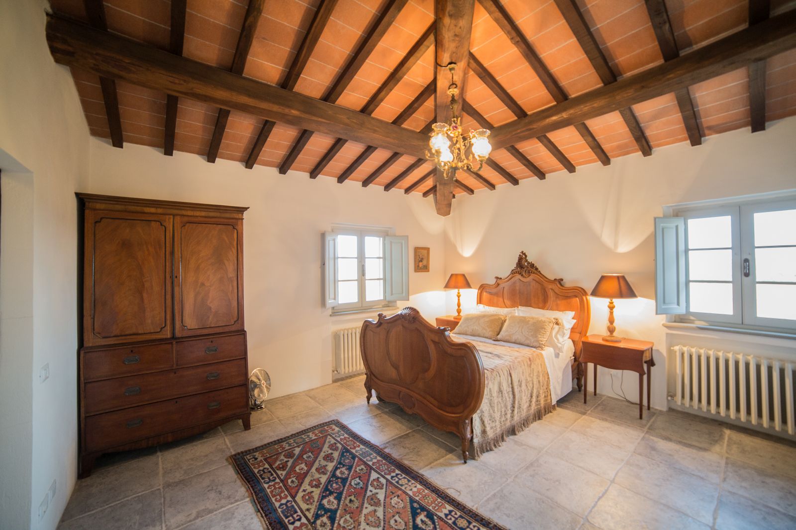 A double bedroom in the farmhouse at Tenuta La Contessa