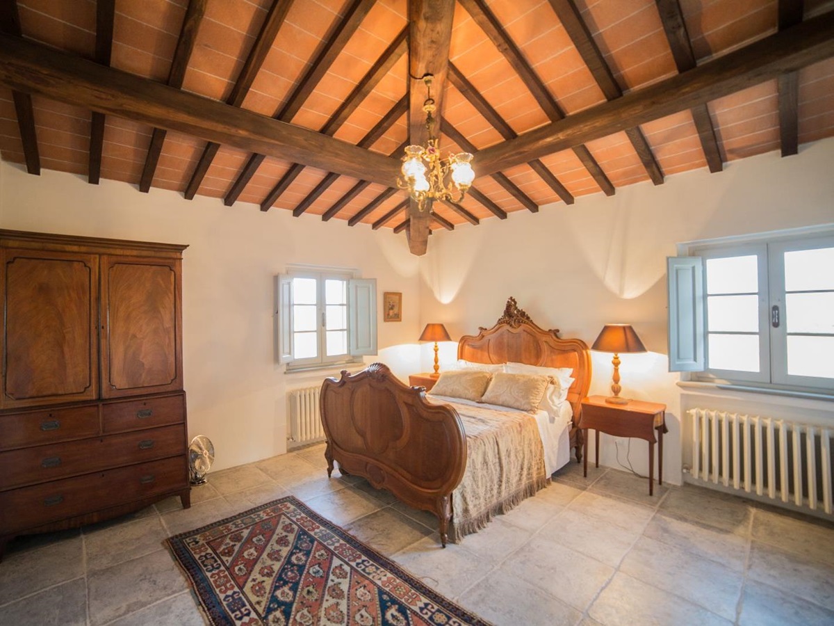 A double bedroom in the farmhouse at Tenuta La Contessa