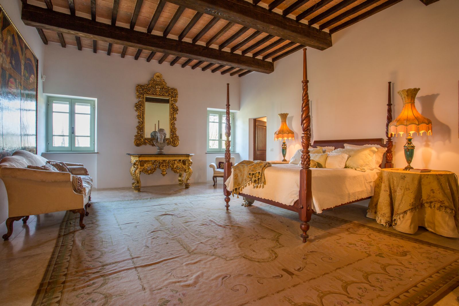 A spacious double bedroom at Tenuta La Contessa