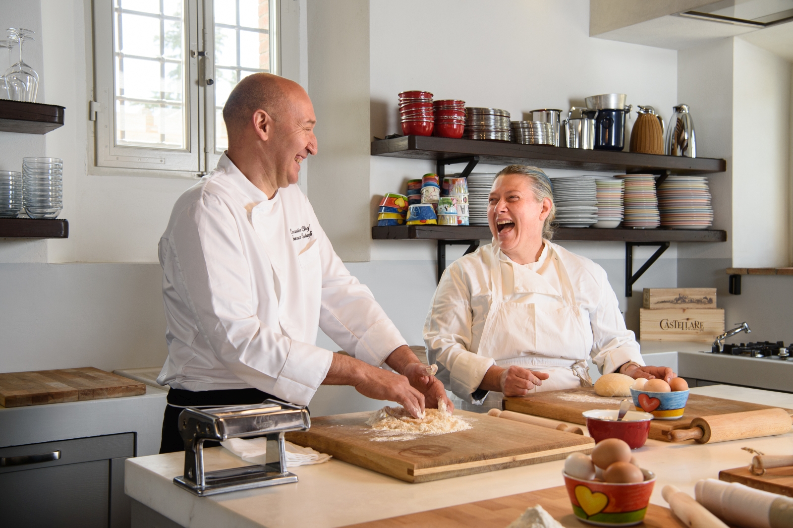 Pasta making with chefs in kitchen at Tramonti in Tuscany, Italy