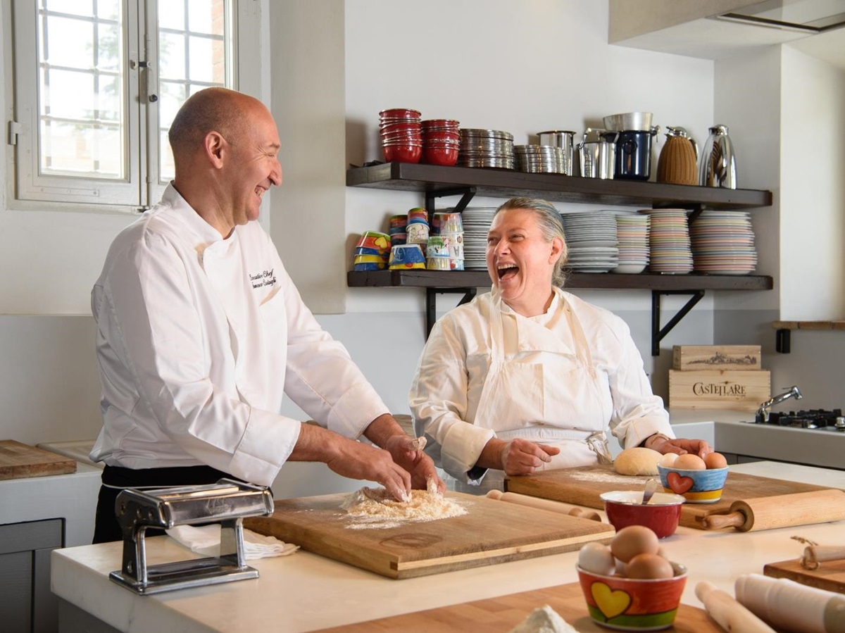Pasta making with chefs in kitchen at Tramonti in Tuscany, Italy