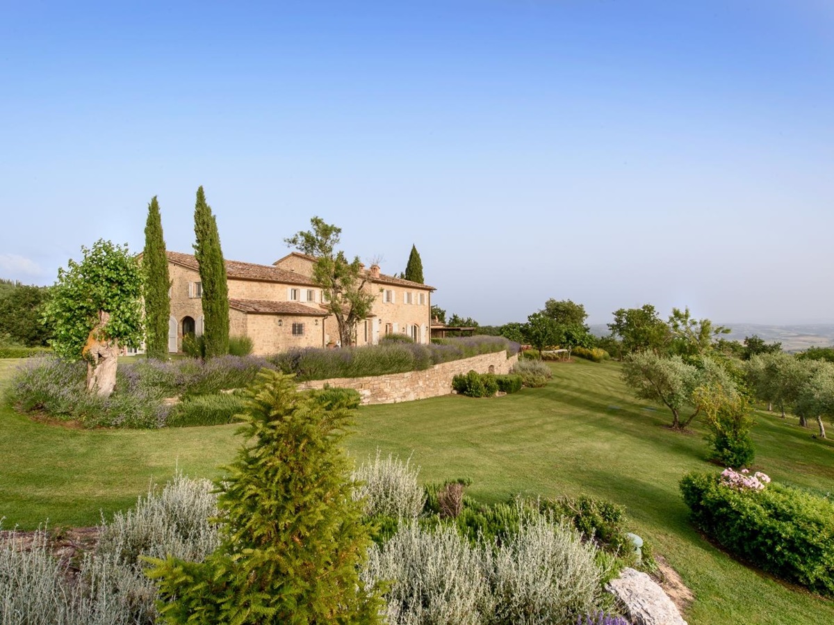 Exterior view of villa, gardens and countryside view at Tramonti in Tuscany, Italy