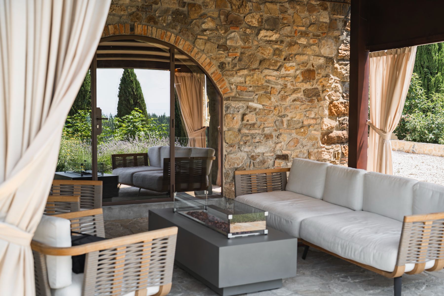 Outdoor seating at Villa Ardore in Tuscany, Italy