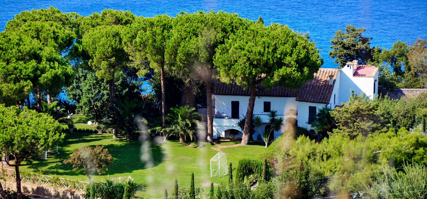 Exterior with trees at Villa Bianca in Tuscany