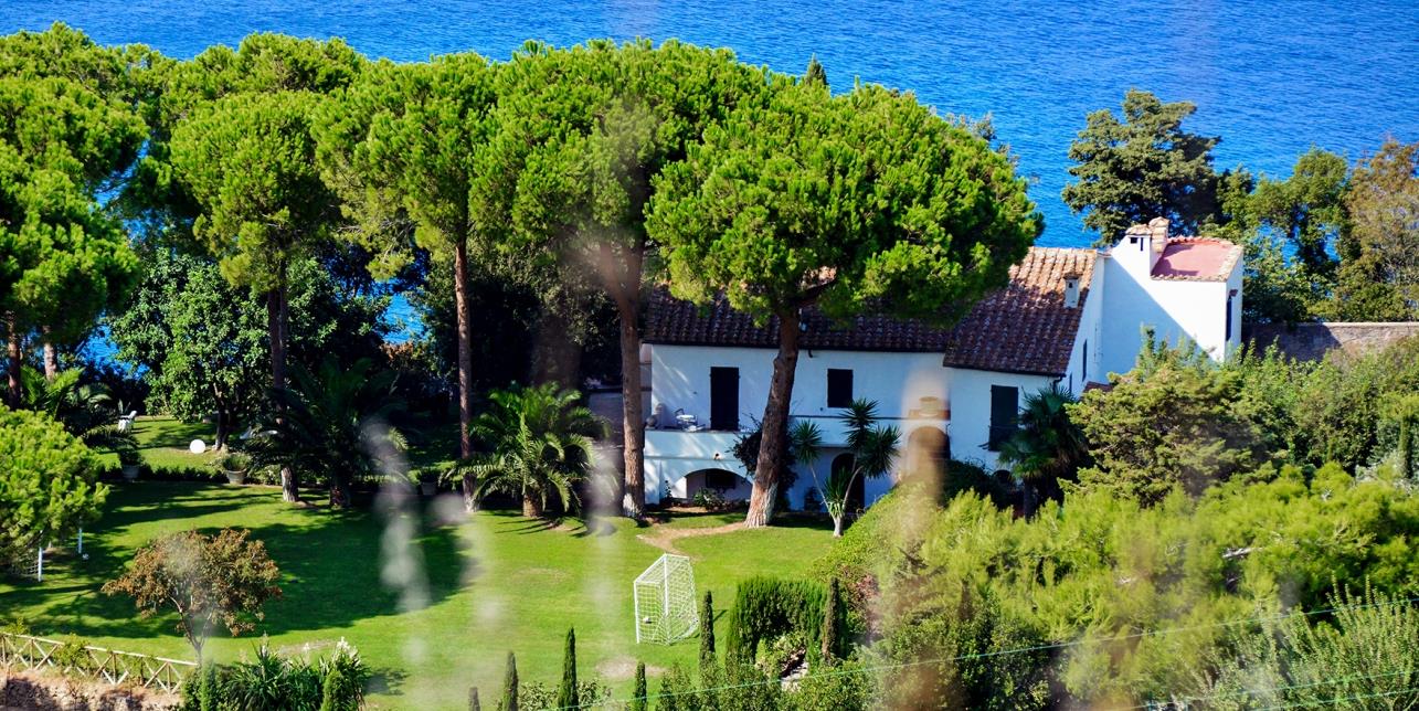 Exterior with trees at Villa Bianca in Tuscany