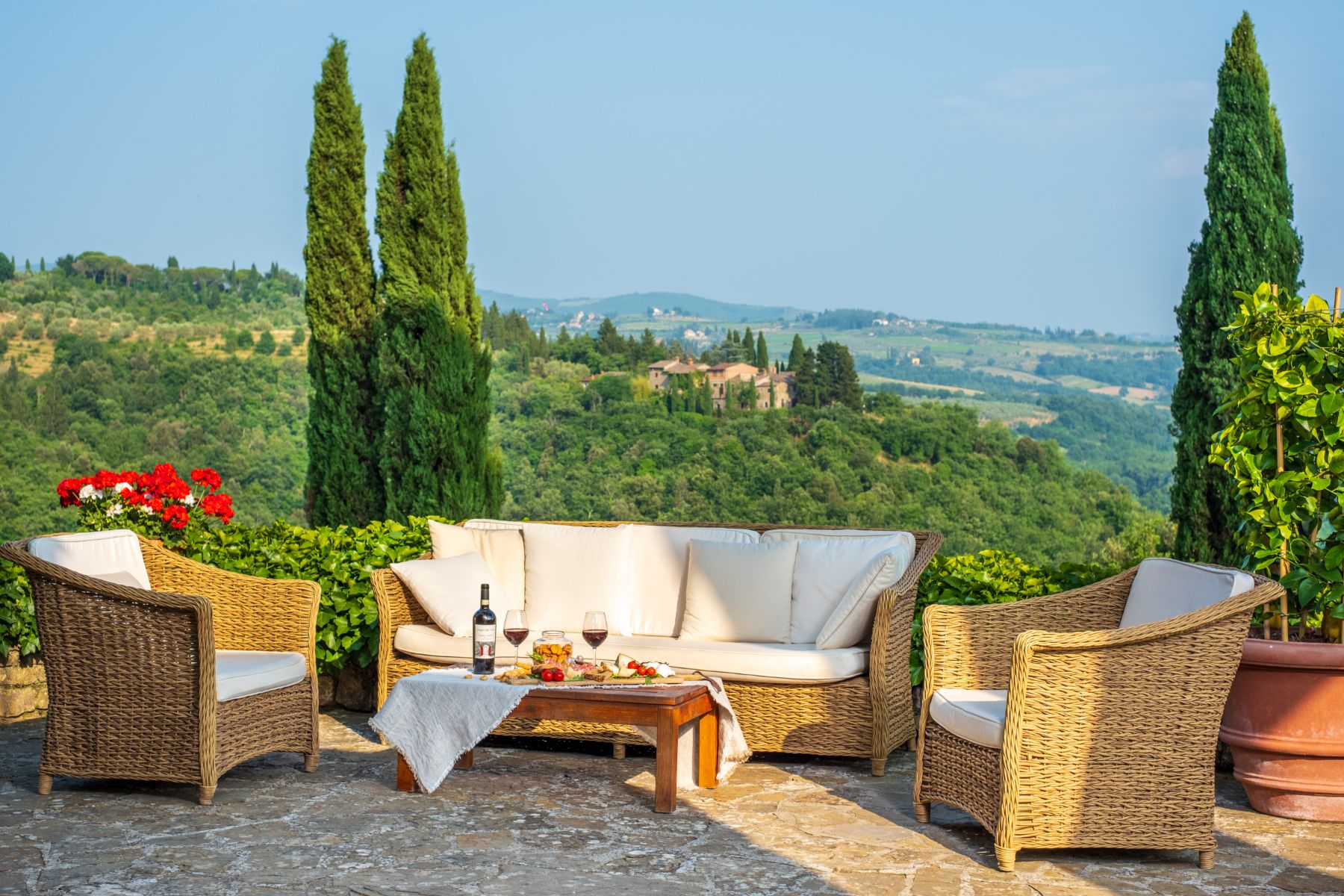 Outdoor seating at Villa Chiocchio in Tuscany