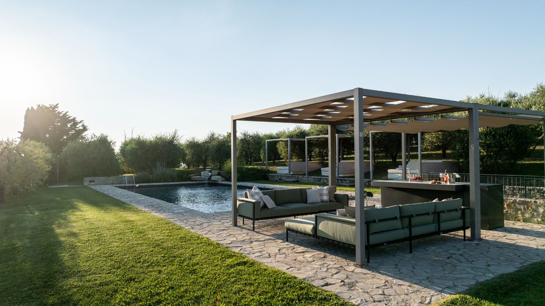 Cabana seating area by the pool at Villa Cispiano in Tuscany