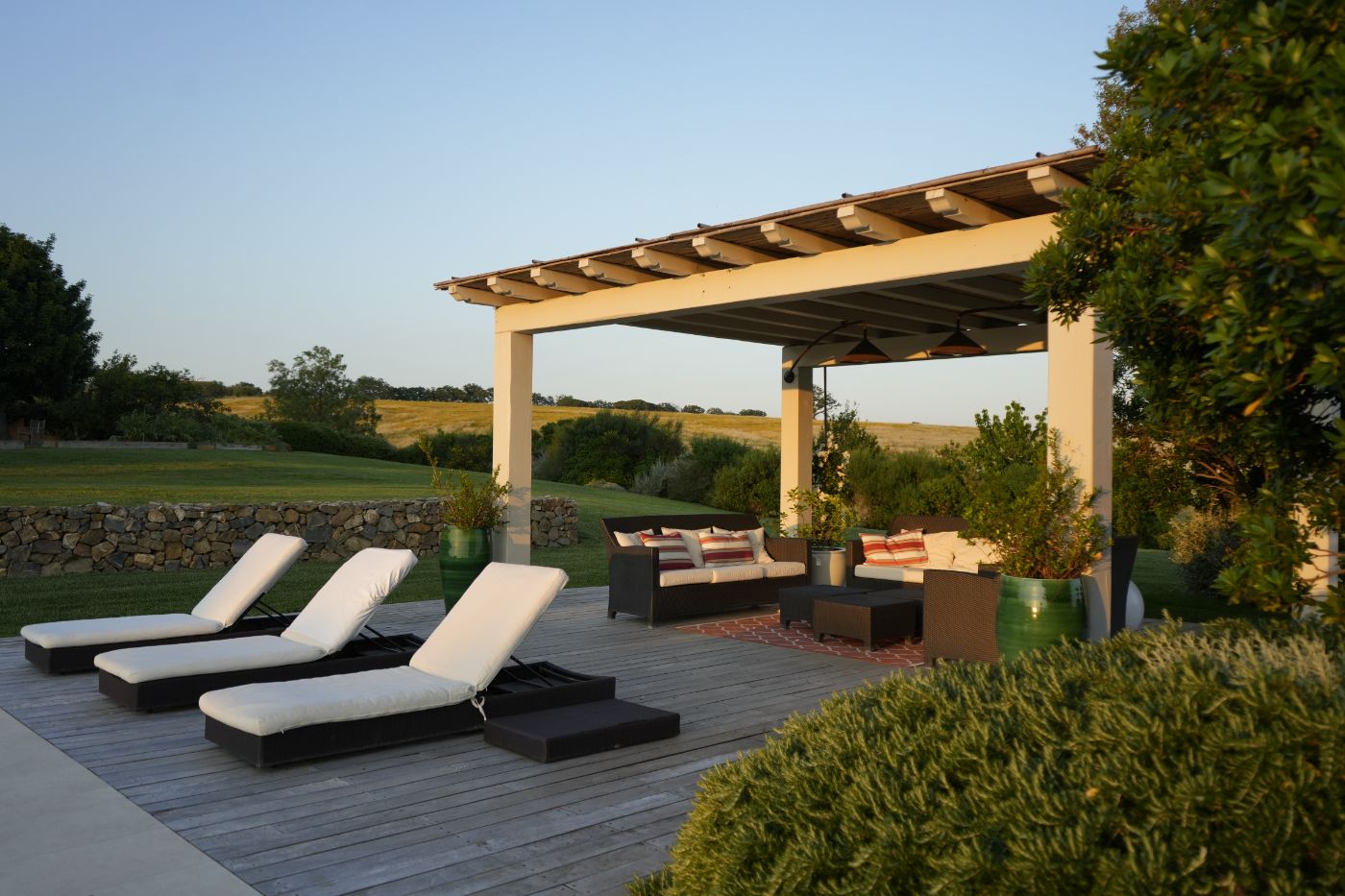 The outdoor pool seating area at Villa del Gelso.
