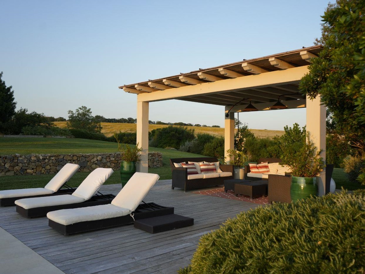 The outdoor pool seating area at Villa del Gelso.