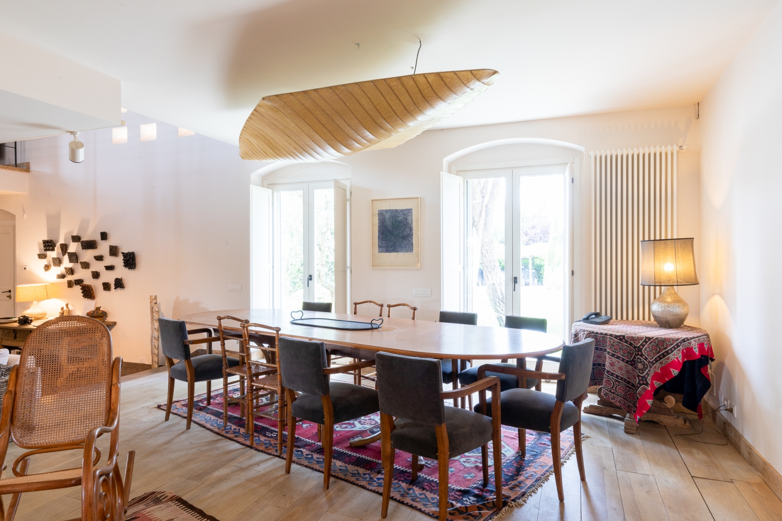 Dining room with dark wooden table at Villa del Gelso, Tuscany