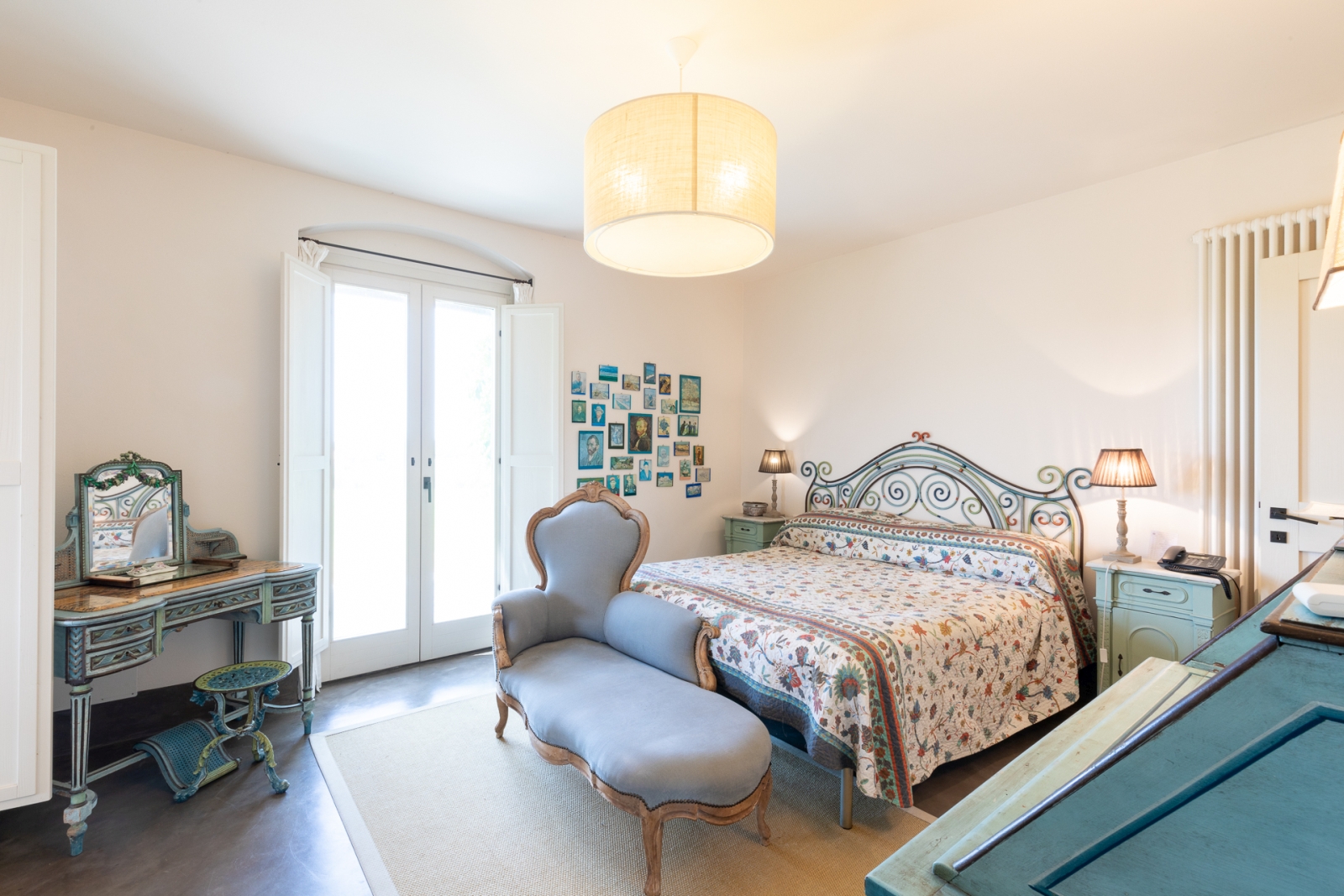 Double Bedroom with floral sheets at Villa del Gelso, Tuscany