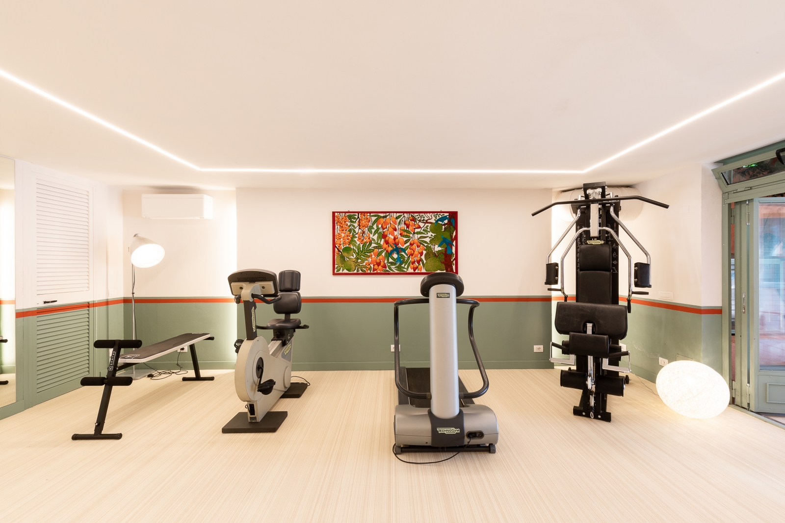 Gym equipment including weights at Villa del Gelso, Tuscany