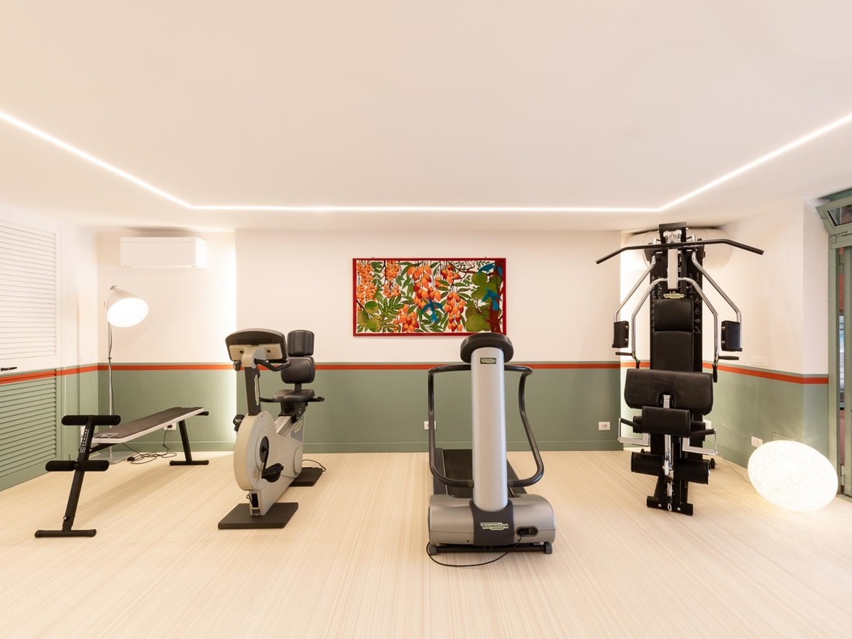 Gym equipment including weights at Villa del Gelso, Tuscany