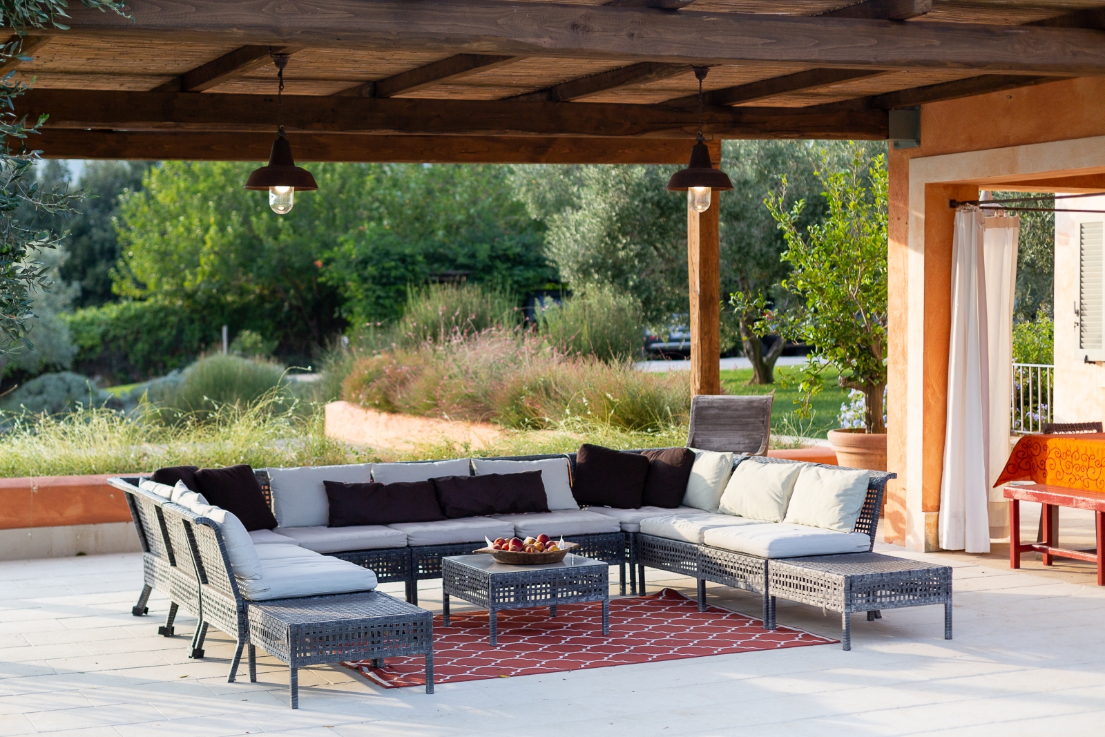 Outdoor seating with coffee table at Villa del Gelso, Tuscany