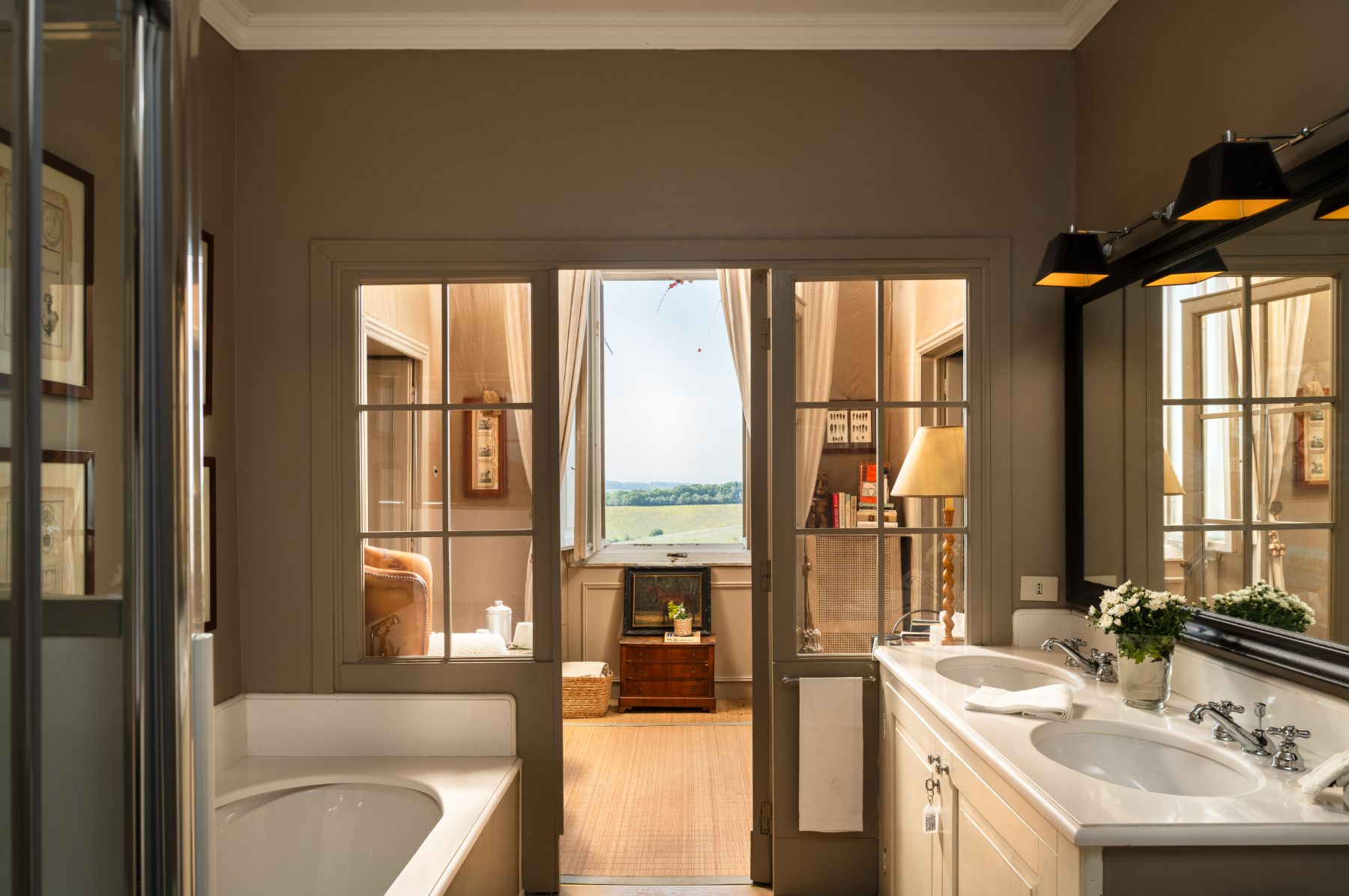 Bathroom with a bath and basin area at Villa delle Vigne in Tuscany