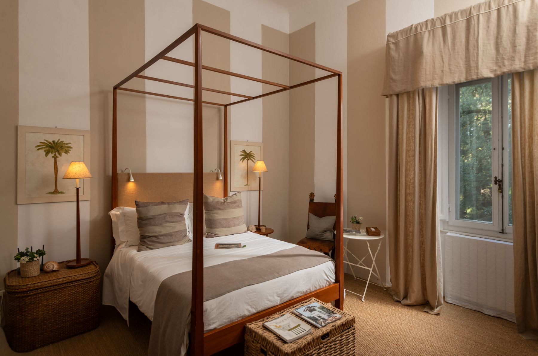 Bedroom with double bed and large window at Villa delle Vigne in Tuscany
