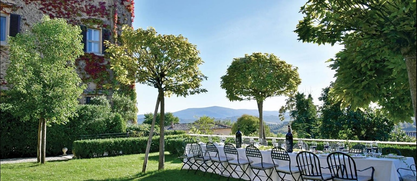 Outdoor dining at Villa delle Vigne Tuscany