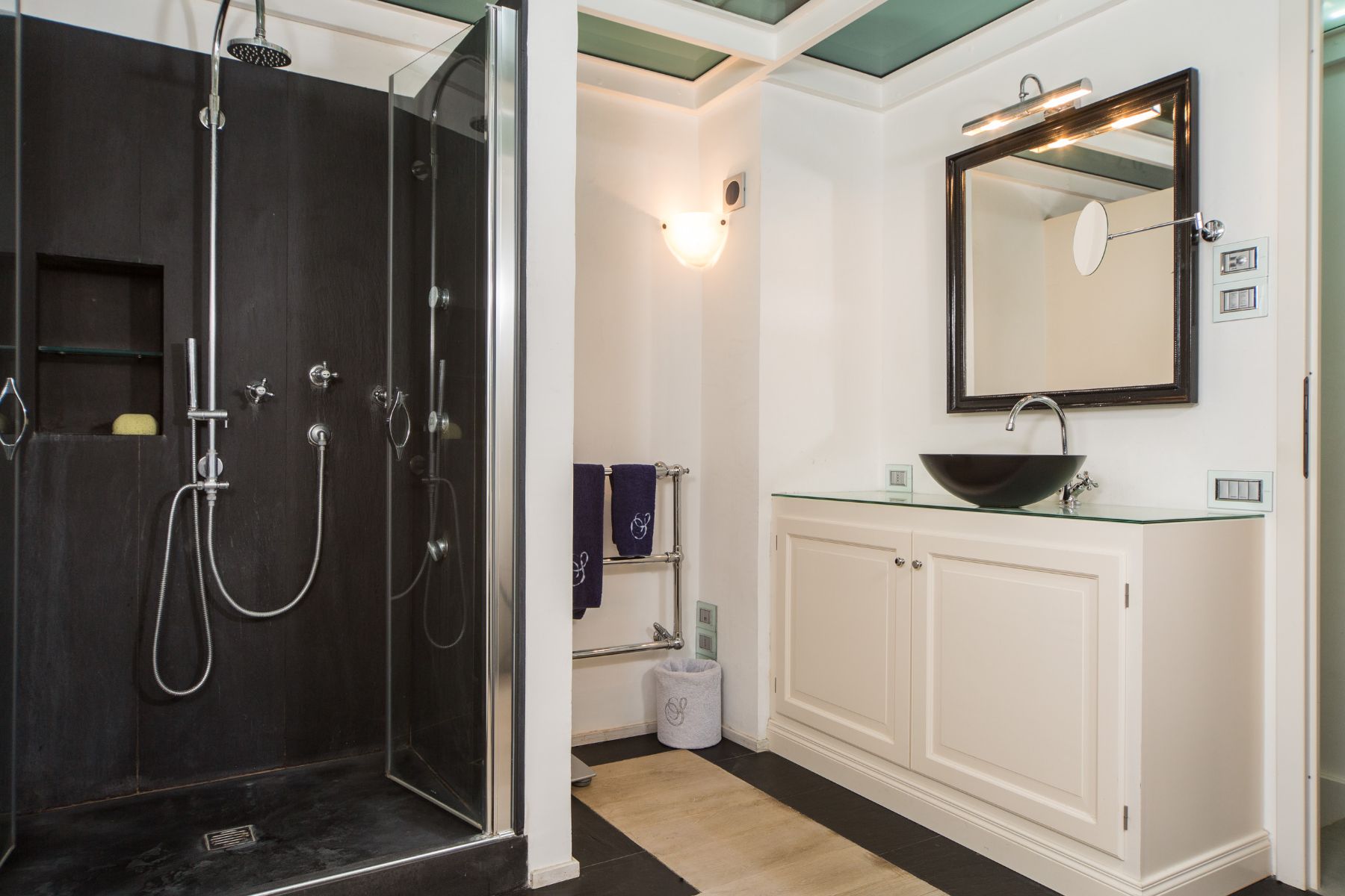 Ensuite bathroom with shower and basin at Villa di Tignano in Tuscany