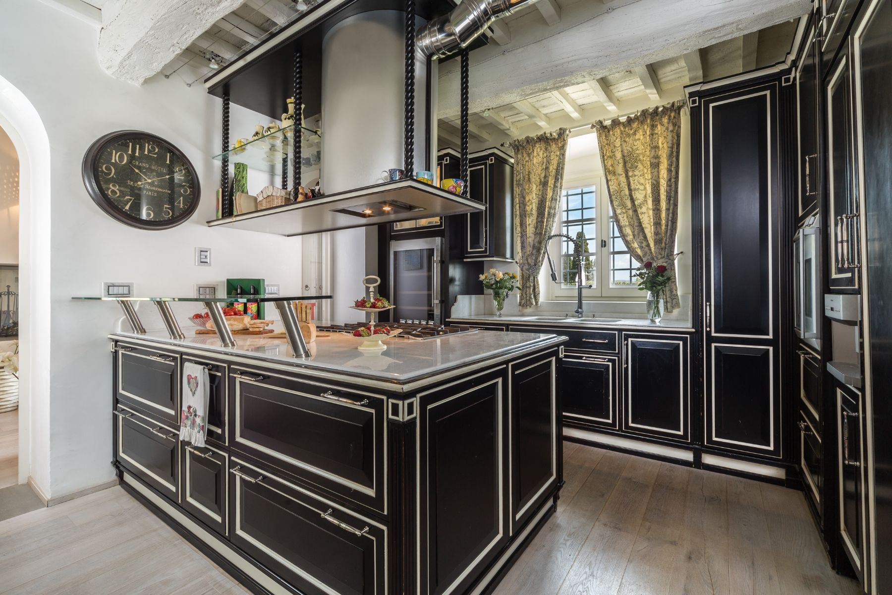 Kitchen in the main villa at villa di Tignano in Tuscany with black furniture