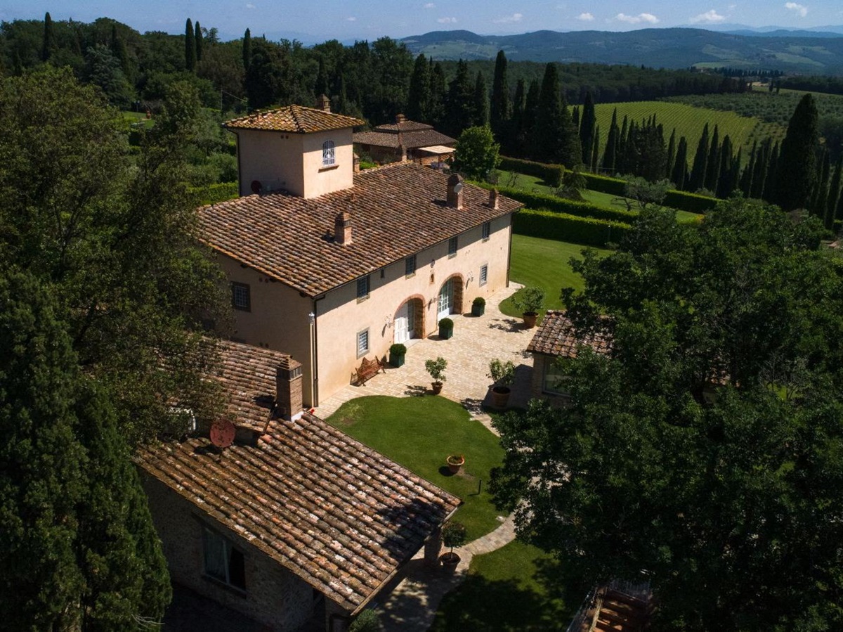 View of the main villa and the dependence building to the left at Villa di Tignano in Tuscany