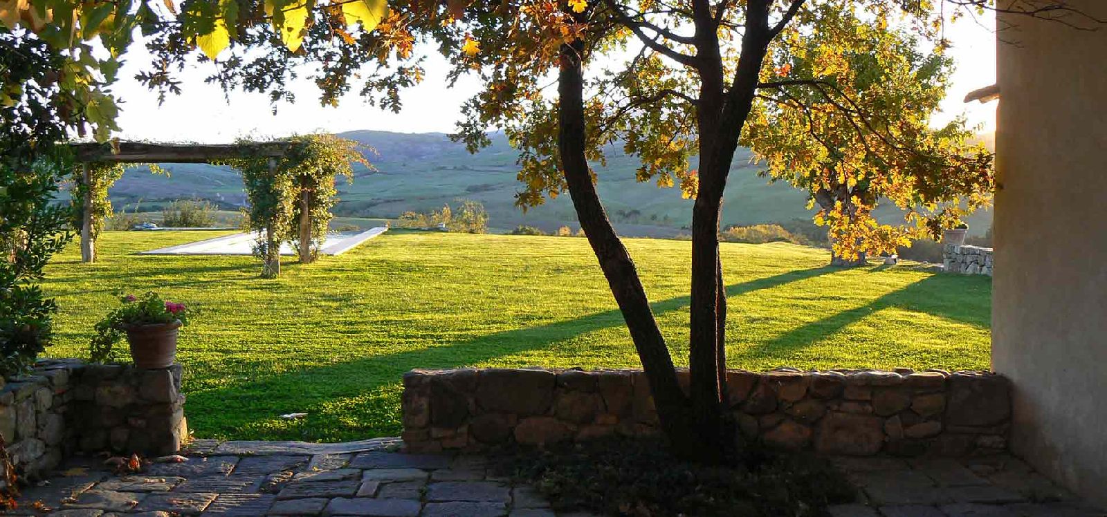 The serene Tuscan countryside surrounding Villa d'Orcia in Italy