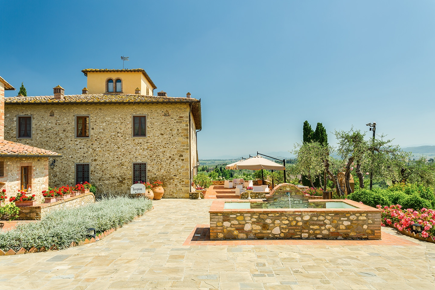 The facade and terrace of Villa Il Sole, Tuscany