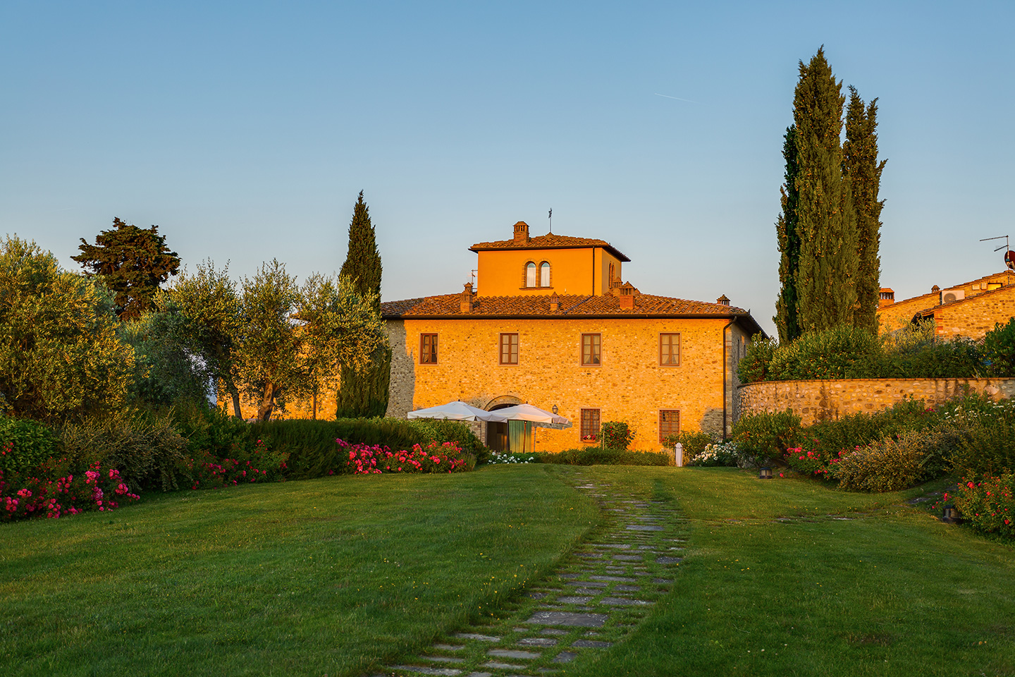 facade of Villa Il Sole, Tuscany, during sunset