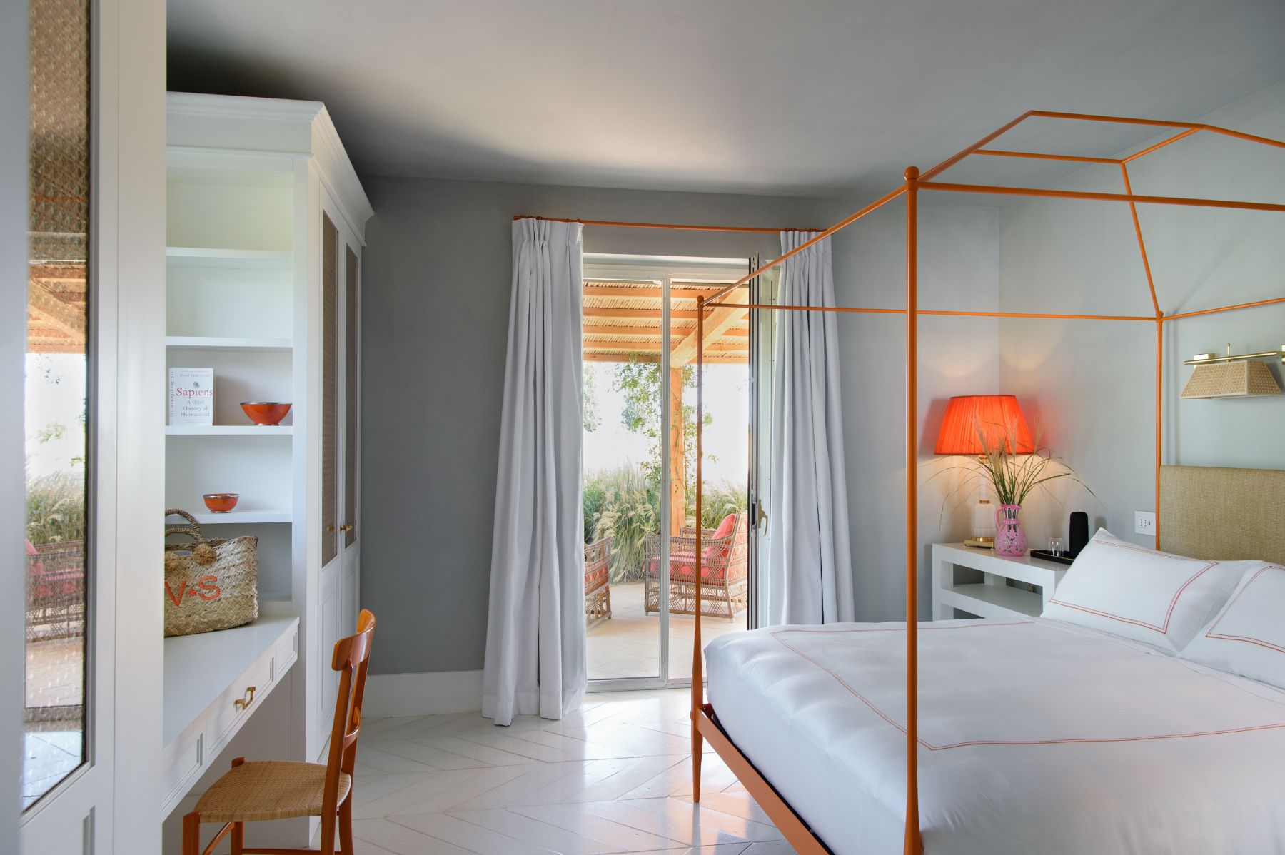Orange Poster Bedroom at Villa Jacaranda in Tuscany 
