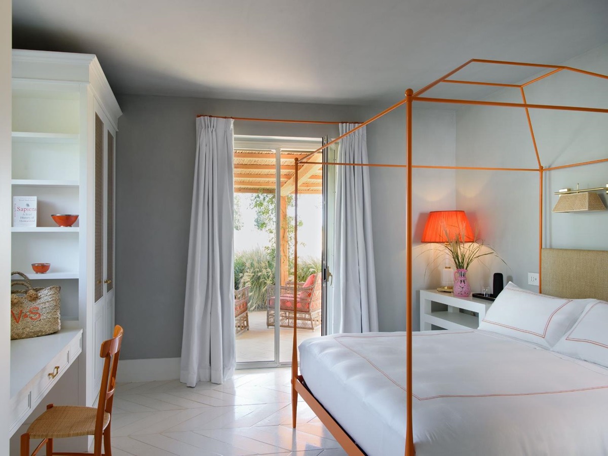 Orange Poster Bedroom at Villa Jacaranda in Tuscany