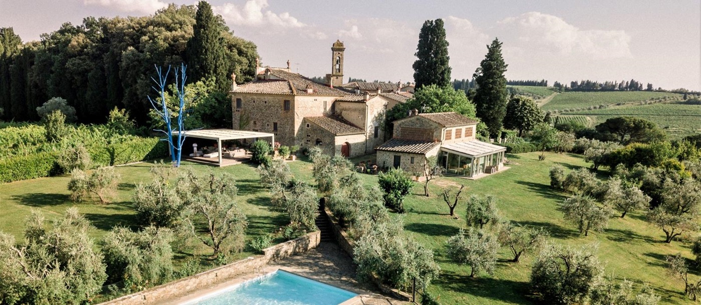 Aerial of the villa with pool and garden at Villa La Castellana in Tuscany